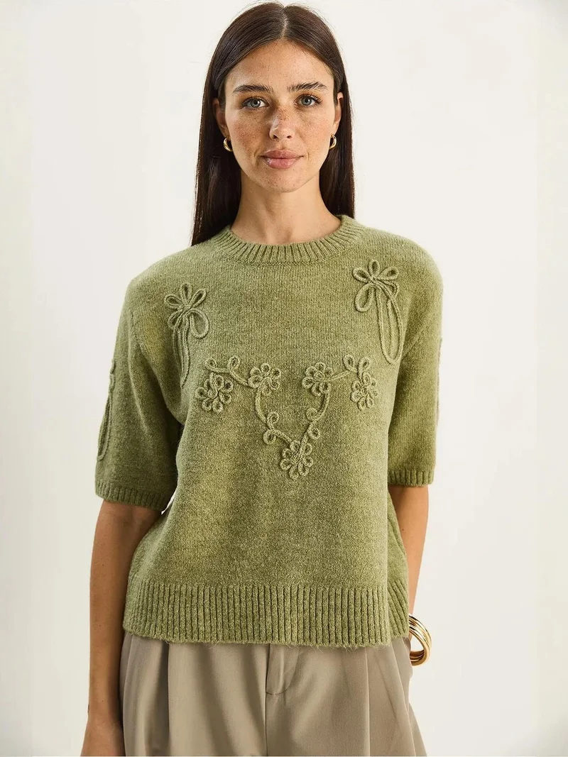 بيانكو لوتشي كنزة محبوكة بياقة دائرية مطرزة من لوتشي