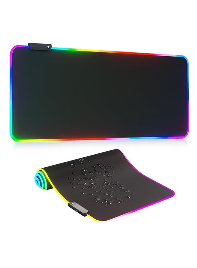 صورة العالمة سجادة ماوس للألعاب كبيرة جدًا مع إضاءة RGB - 14 وضع إضاءة، سجادة ماوس LED ناعمة موسعة، قاعدة مطاطية مضادة للانزلاق، سجادة للكمبيوتر ولوحة مفاتيح ماوس (31.5 × 12 بوصة)  - Image 1