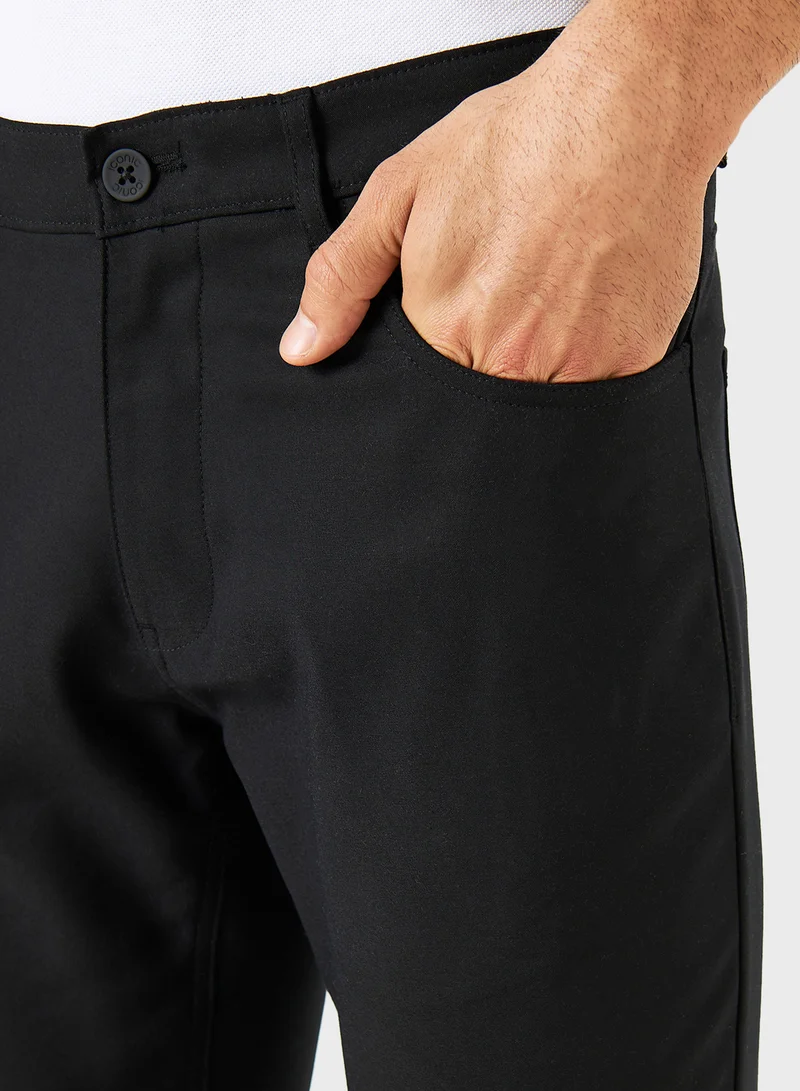 ايكونيك Iconic Solid Slim Fit Pants with Pockets