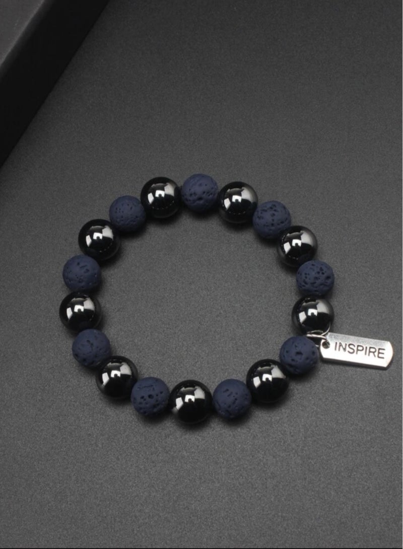 إنسباير اسوارة رجالية مصنوعة من الحجر البركاني الازرق الطبيعي النادر وحجر الهيماتيت الاسود - Image 1