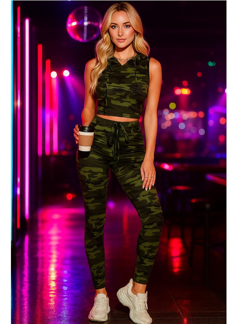 شارلي طقم هودي وبنطال رياضي نسائي مموه  - بلوزة قصيرة بدون أكمام بغطاء للرأس وبنطال ضيق عالي الخصر - بدلة رياضية أنيقة من قطعتين للارتداء غير الرسمي والصالة الرياضية والسفر وأسلوب الشارع - نسيج مطاطي ناعم - ملابس رياضية عصرية - أزياء حضرية حديثة - ملاءمة مريحة للاستخدام اليومي - خياطة متينة - مثالية للصيف والمواسم الانتقالية - Image 1