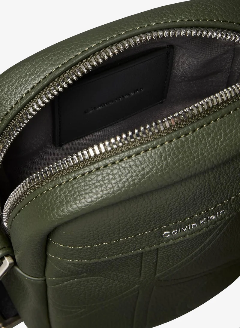 CALVIN KLEIN Deep Depths Allover Embossed Emblem Logo Slim Reporter Bag for Men | Best Price UAE