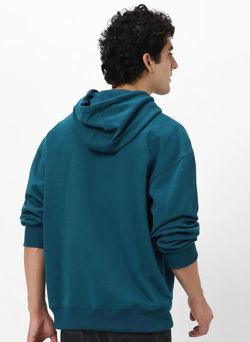 Urbano Fashion  Urbano Fashion Men's Fog Teal Green Cotton Solid Oversized Hooded Neck Sweatshirt for Men | Best Price UAE