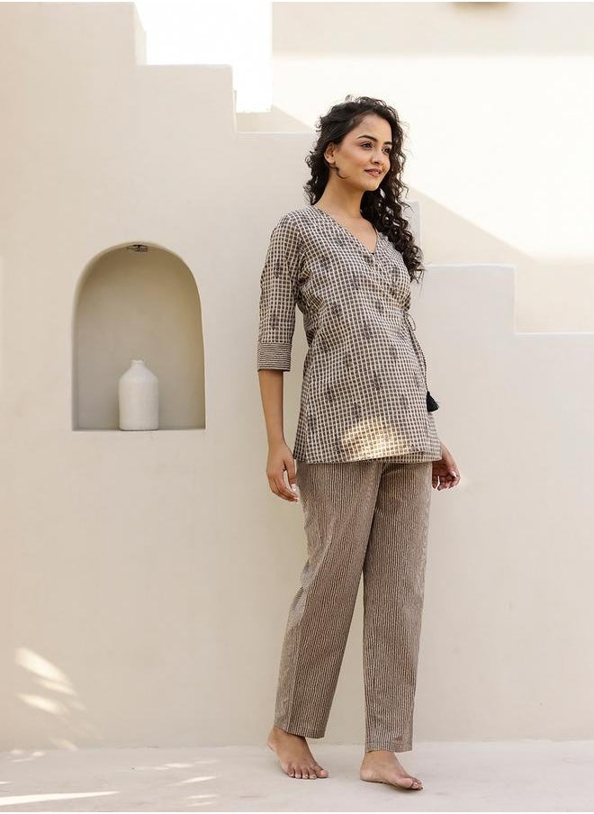 sanskrutihomes All-Over Print Wrap Top with Striped Trousers Co-Ords by Styli  - Image 1