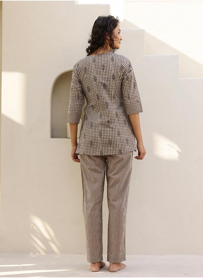 sanskrutihomes All-Over Print Wrap Top with Striped Trousers Co-Ords by Styli  - Image 4