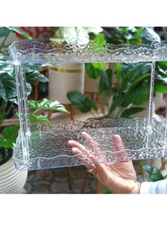 Generic Acrylic shelf, two floors A bathroom organizer shelf that organizes your shampoo, shower, and makeup tools. It can also be used on the dressing table for perfumes and makeup. Pure decorated acrylic It consists of a large shelf and a small shelf The dimensions of the large shelf are 33 cm long and 16 cm wide, and the dimensions of the small shelf are 32 cm long, 12 cm wide, and 21 cm high, and the dimensions between the two shelves are 17 cm  - Image 1