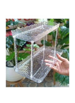 Generic Acrylic shelf, two floors A bathroom organizer shelf that organizes your shampoo, shower, and makeup tools. It can also be used on the dressing table for perfumes and makeup. Pure decorated acrylic It consists of a large shelf and a small shelf The dimensions of the large shelf are 33 cm long and 16 cm wide, and the dimensions of the small shelf are 32 cm long, 12 cm wide, and 21 cm high, and the dimensions between the two shelves are 17 cm  - Image 2