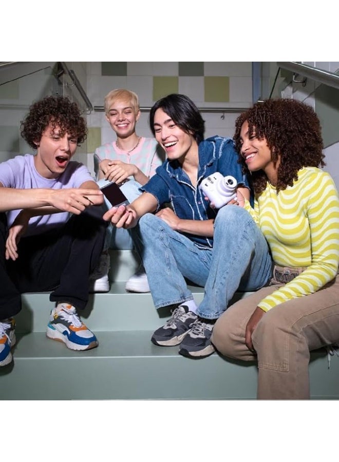 إنستاكس كاميرا ميني 12 بفيلم فوري مع خاصية الضبط التلقائي للتعرض للاضاءة وعدسة سيلفي مدمجة من انستاكس، ازرق باستيل - Image 4