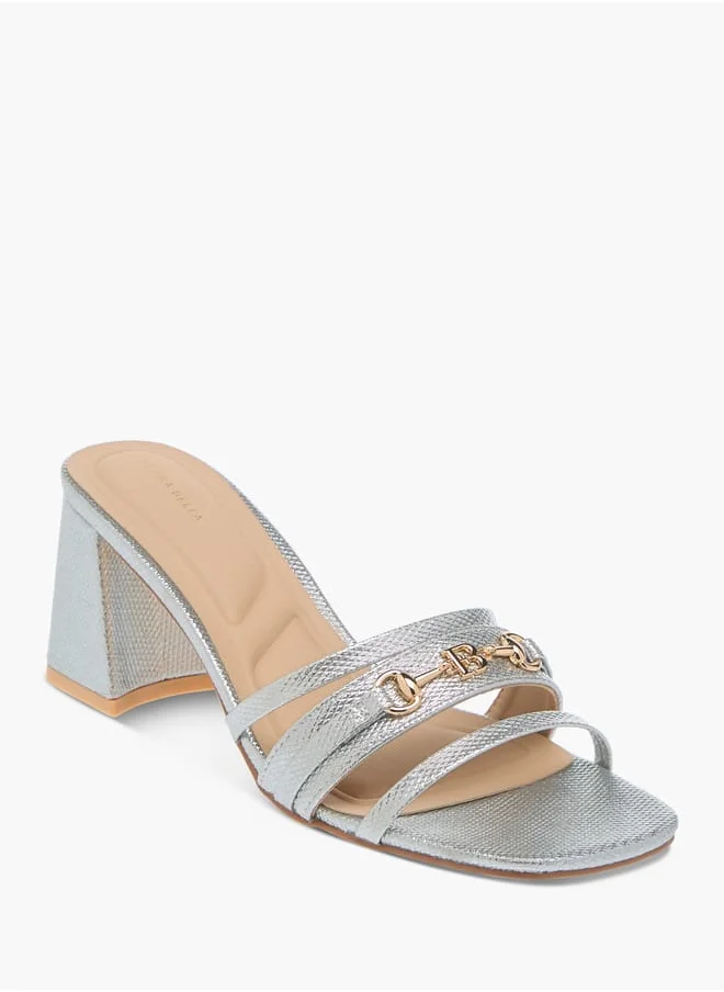 فلورا بيلا من شو إكسبرس Womens Metal Accent Slip-On Sandals With Block Heels