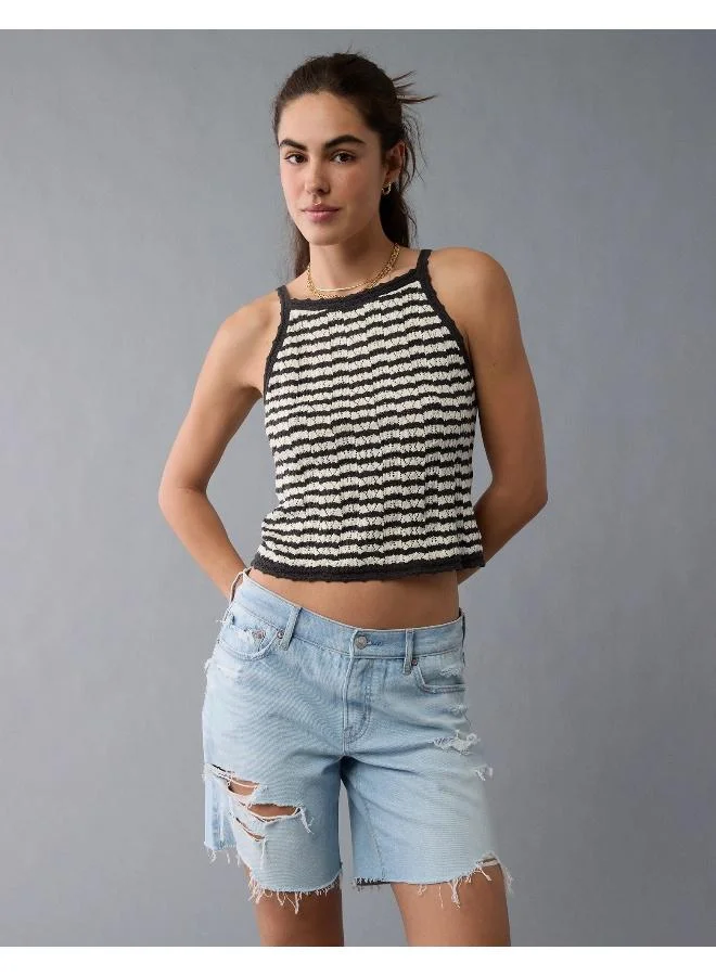 Elevate your warm weather wardrobe with this chic tank top, crocheted for a luxe textured look.