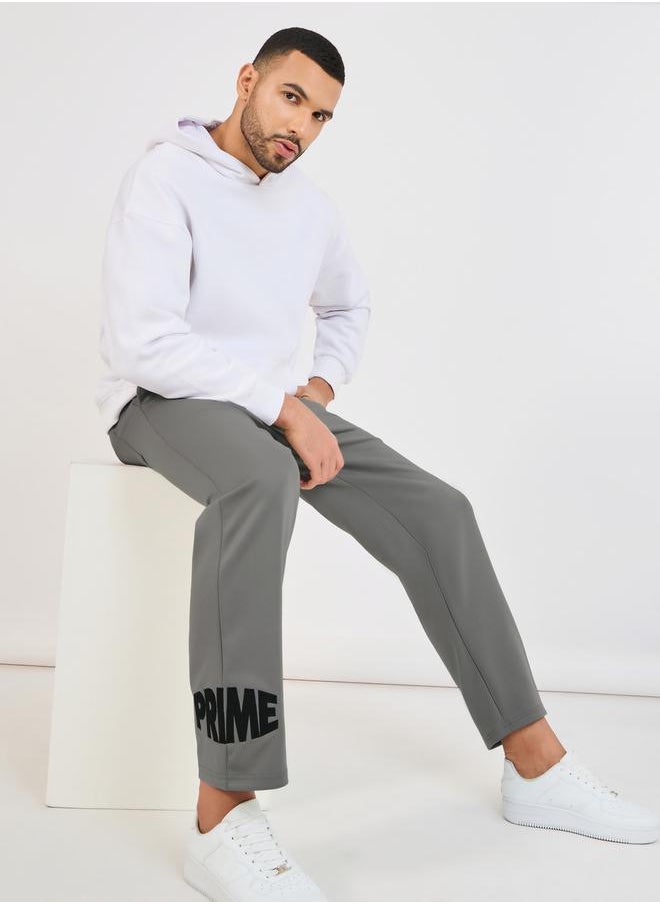 Styli Relaxed Fit Open Hem Embroidered Joggers  - Image 1