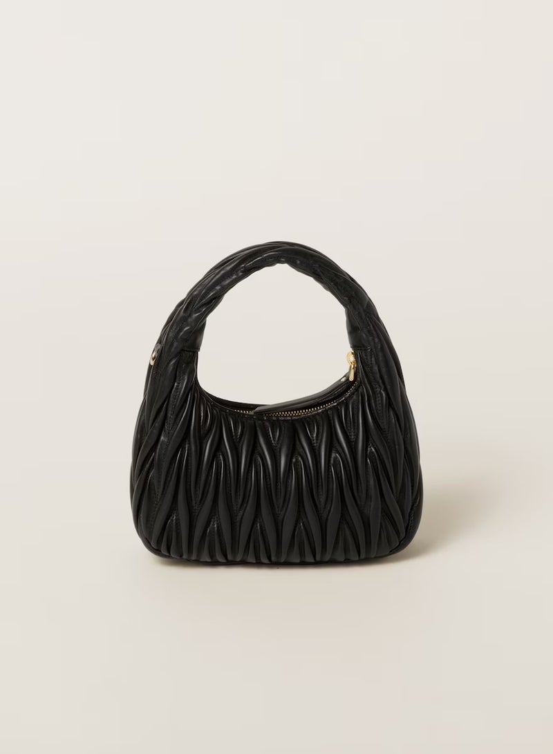 miu miu small crescent-shaped handbag made of leather - Image 3