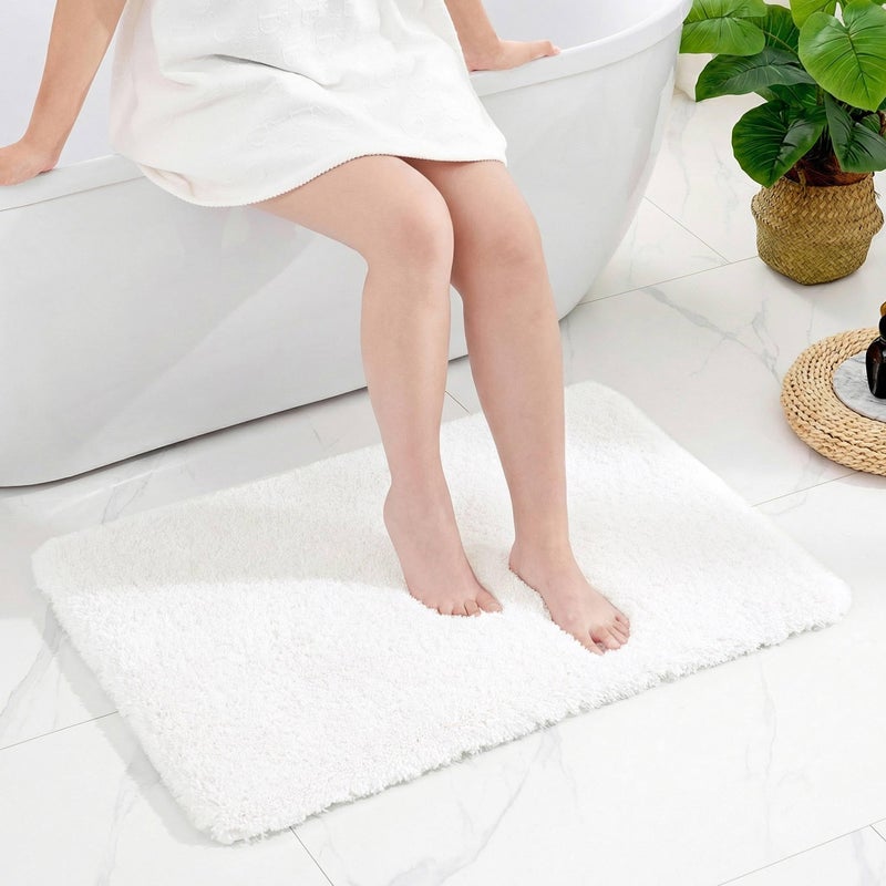 Disolla White Bathroom Rug 24x36 - Non-Slip Plush Thick Bath Mat, Highly Absorbent & Ultra Soft Fluffy Floor Mat, Machine Washable for Shower and Tub - Image 1