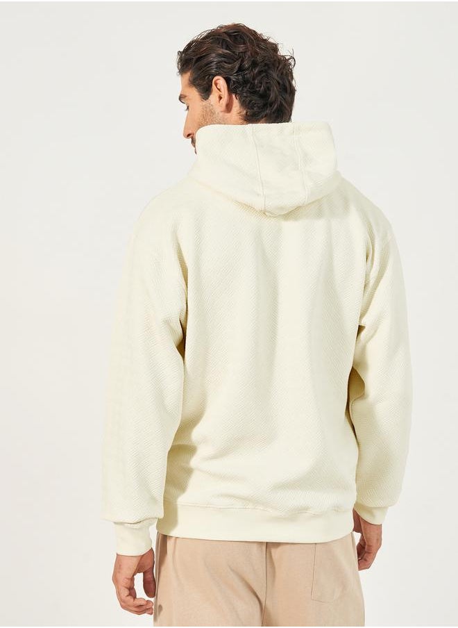 Geo Textured Relaxed Fit Hoodie with Kangaroo Pocket - pzsku/Z94262654D0FF80CFBF5FZ/45/_/1733818960/eca45d67-cc6d-4f40-a636-cbf4163f6ef2