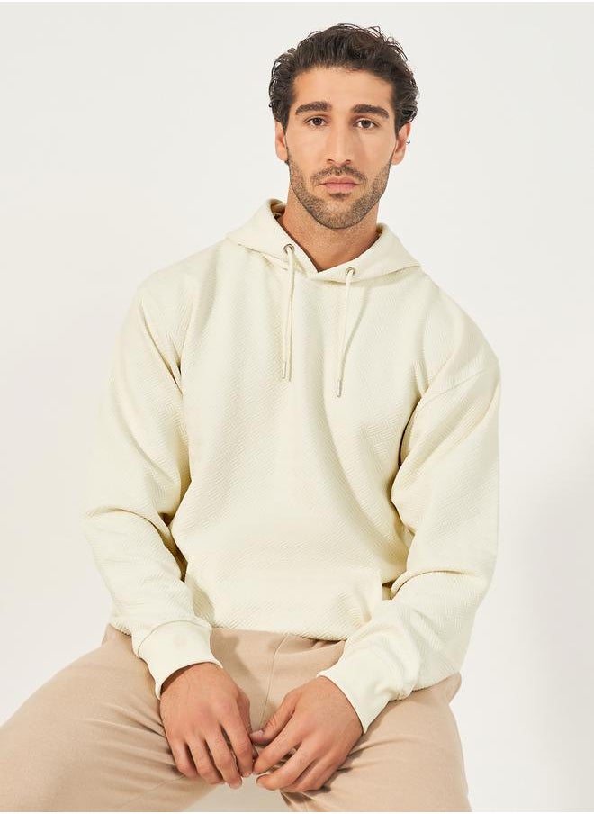 Geo Textured Relaxed Fit Hoodie with Kangaroo Pocket - pzsku/Z94262654D0FF80CFBF5FZ/45/_/1733818973/bb55dd1b-8bd7-4477-8c85-01e5c691a5b4