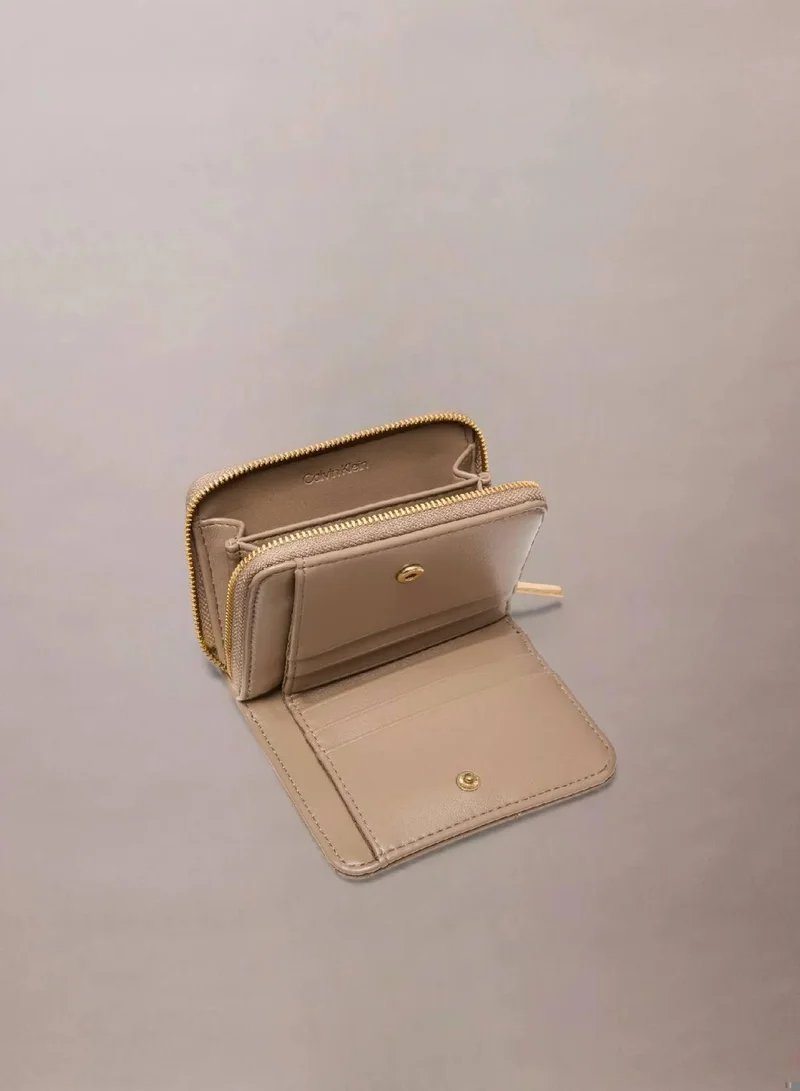 Calvin Klein Desert Taupe Quilted Zip Around Wallet for Women | Best Price UAE