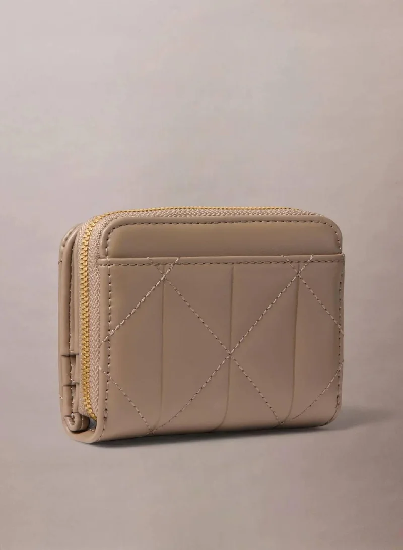 Calvin Klein Desert Taupe Quilted Zip Around Wallet for Women | Best Price UAE