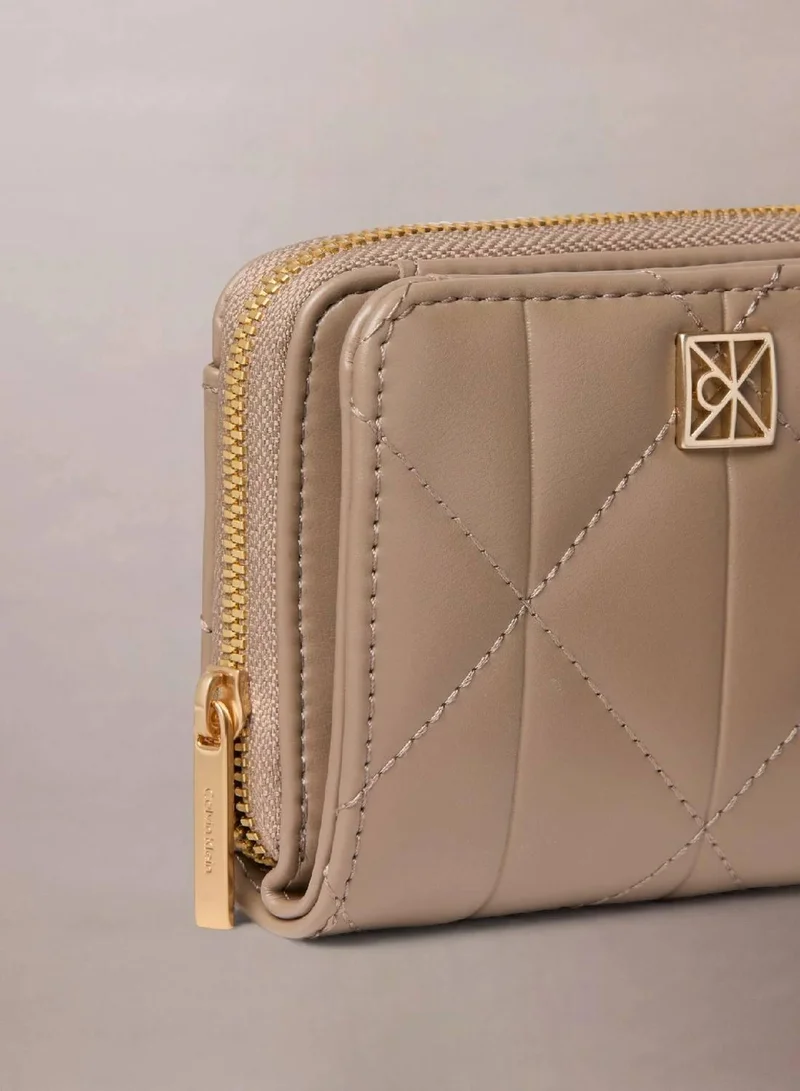 Calvin Klein Desert Taupe Quilted Zip Around Wallet for Women | Best Price UAE