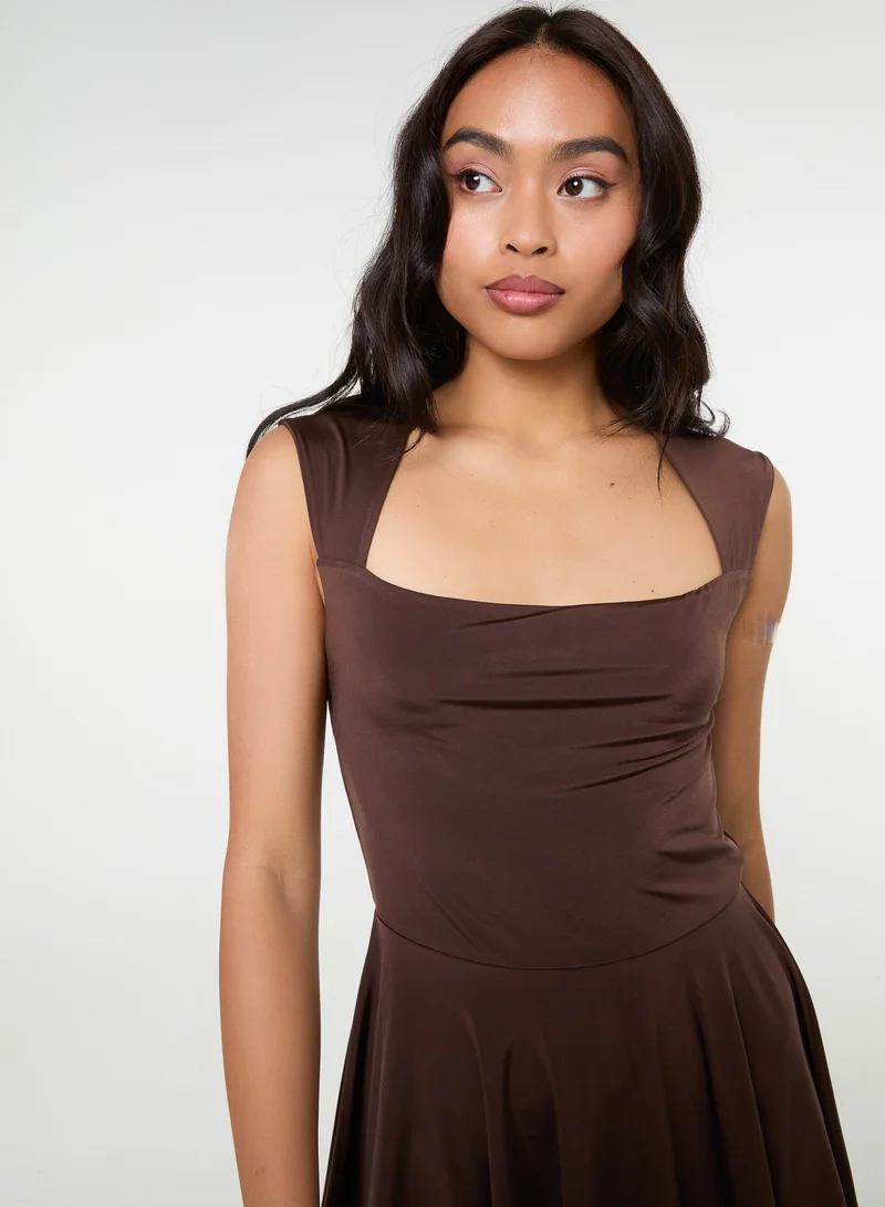 Pink Vanilla  Slinky Open Back Mini Flippy Playsuit for Women | Best Price UAE