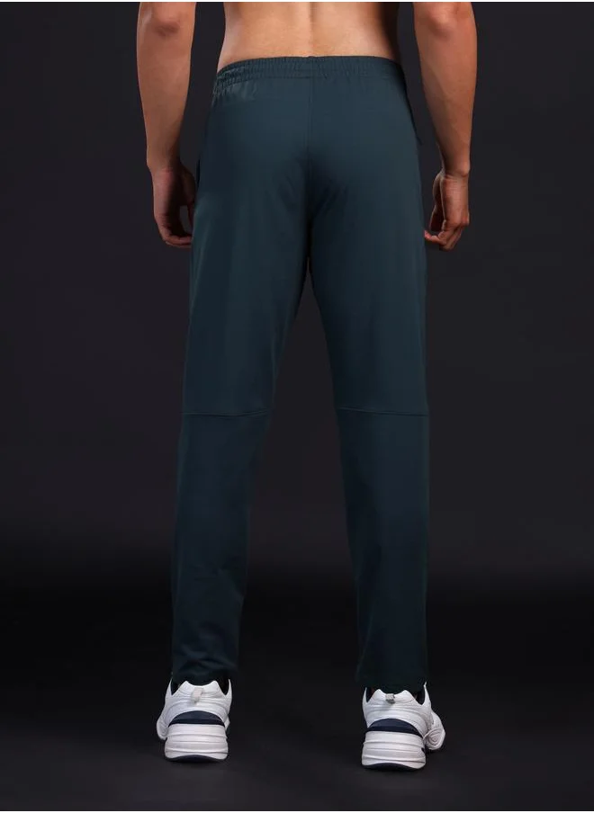 تكنوسبورت Technosport Solid Slim Fit Trackpants with Drawstring