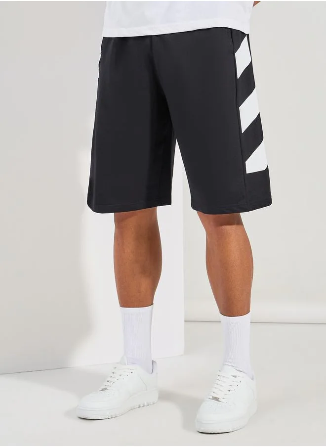 ستايلي Oversized Cotton Terry Block Striped Shorts