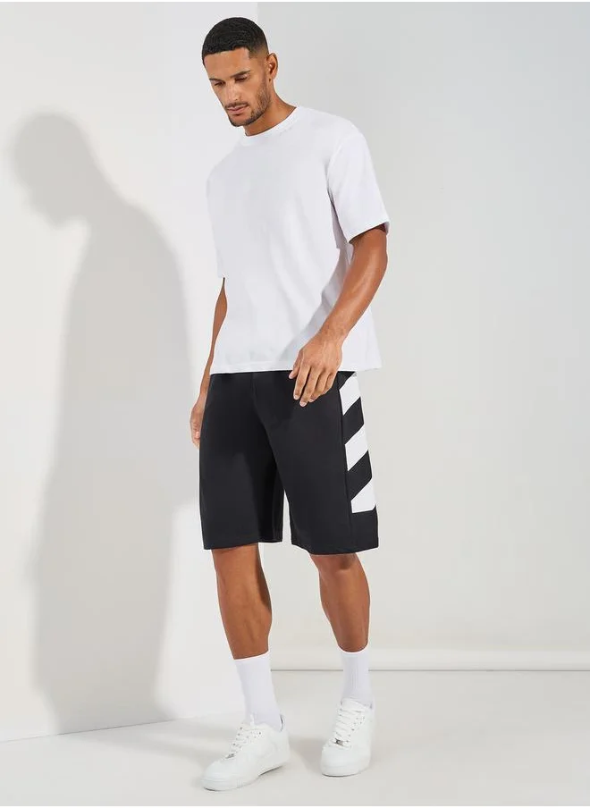 ستايلي Oversized Cotton Terry Block Striped Shorts