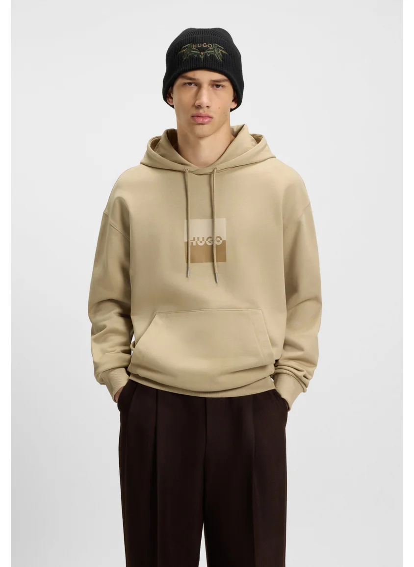 هوجو Relaxed-fit hoodie in cotton terry with split logo