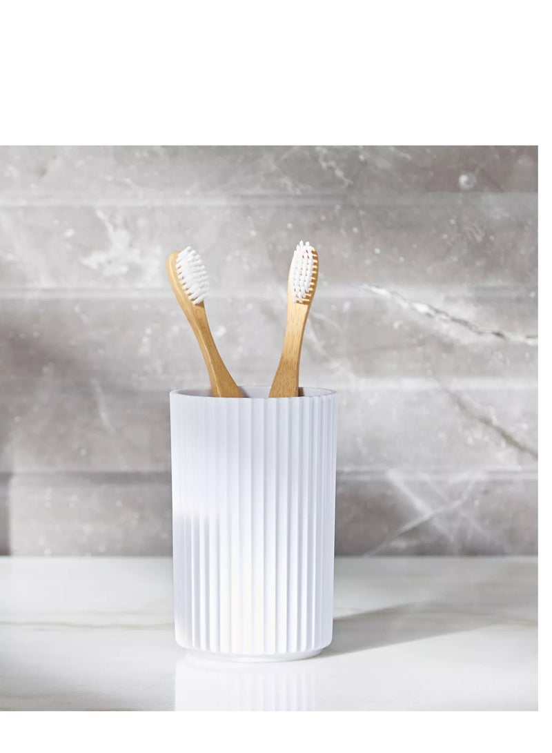 A mug featuring a ribbed design on the outside and a modern feel - Image 1