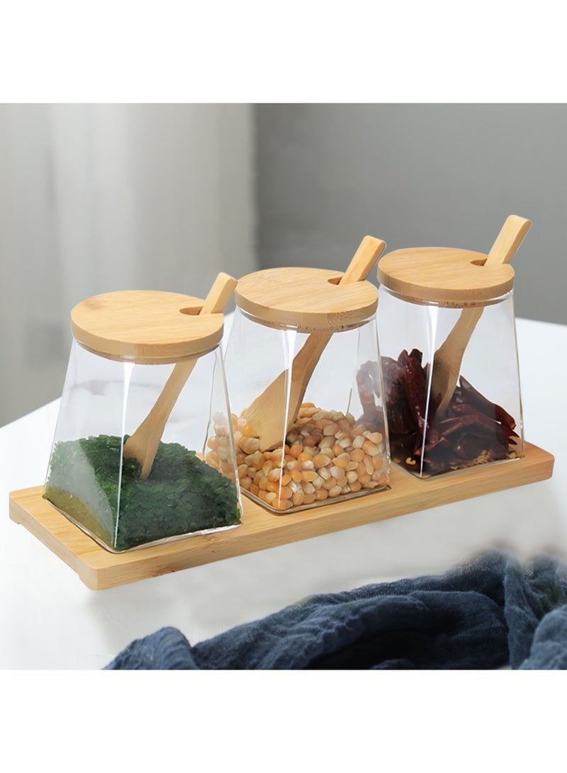 مجموعة 3 برطمانات زجاجية شفافة عالية الجودة مع غطاء خيزران طبيعي وملعقة خشبية لكل برطمان وحامل خشبي لجميع البرطمانات – علب تخزين مطبخ متعددة الاستخدام لتخزين السكر الأبيض والبني، القهوة، الشاي، الطحين، المكسرات، الحلوى، الأملاح، التوابل، الأعشاب، البهارات والمكونات الجافة الأخرى – عبوات منزلية أنيقة وعملية للحفاظ على المطبخ مرتب ومنظم، مناسبة للتقديم على الطاولة أو كهدية عملية وعصرية - Image 3