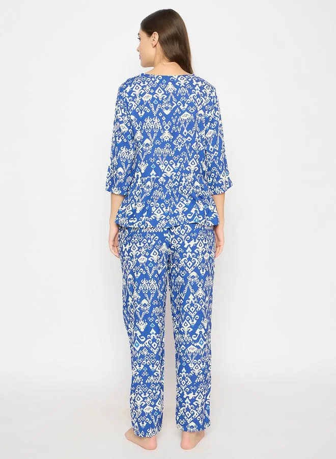 Clovia Women's Printed Peplum Top & Navy-Blue Pyjama Set by Styli