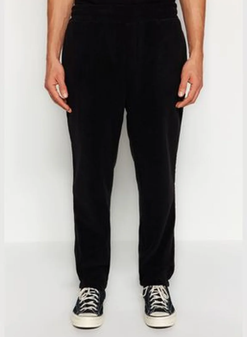 trendyol Black Men's Regular/Nomal Fit Keeping You Warm Thick Fleece Elastic Legs Concealed Cord Sweatpants.