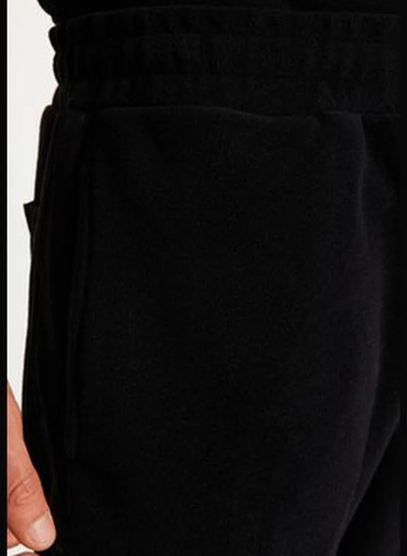 trendyol Black Men's Regular/Nomal Fit Keeping You Warm Thick Fleece Elastic Legs Concealed Cord Sweatpants.