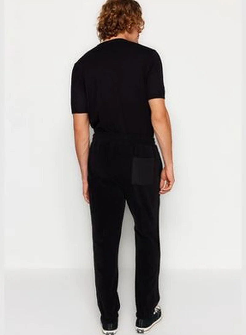 trendyol Black Men's Regular/Nomal Fit Keeping You Warm Thick Fleece Elastic Legs Concealed Cord Sweatpants.