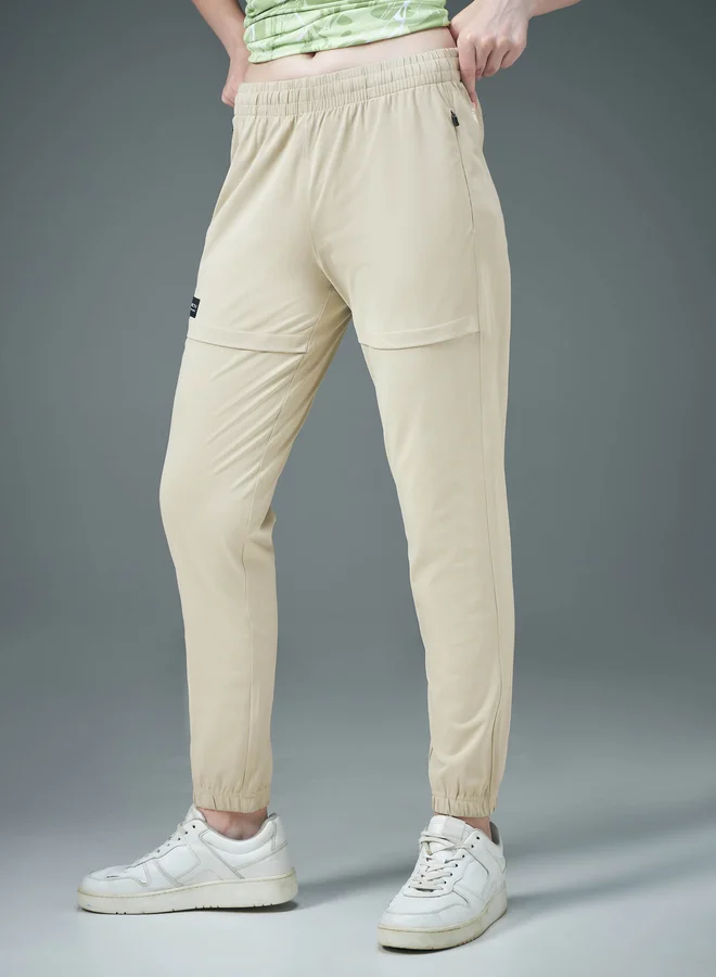 Technosport beige Technosport Women Beige Solid 4-Way Stretch Joggers for Women | Best Price UAE