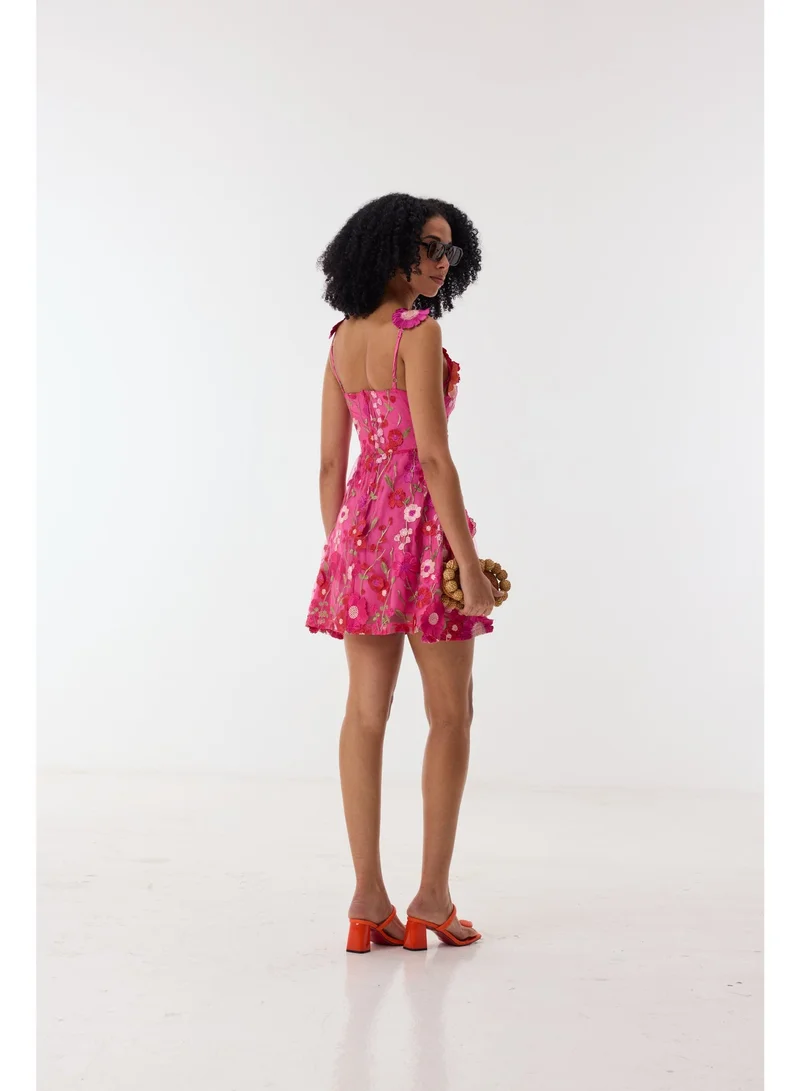 أشيتا فرنانديز فستان قصير مطرز بالدانتيل الزهري بلا أكمام بياقة مربعة - وردي