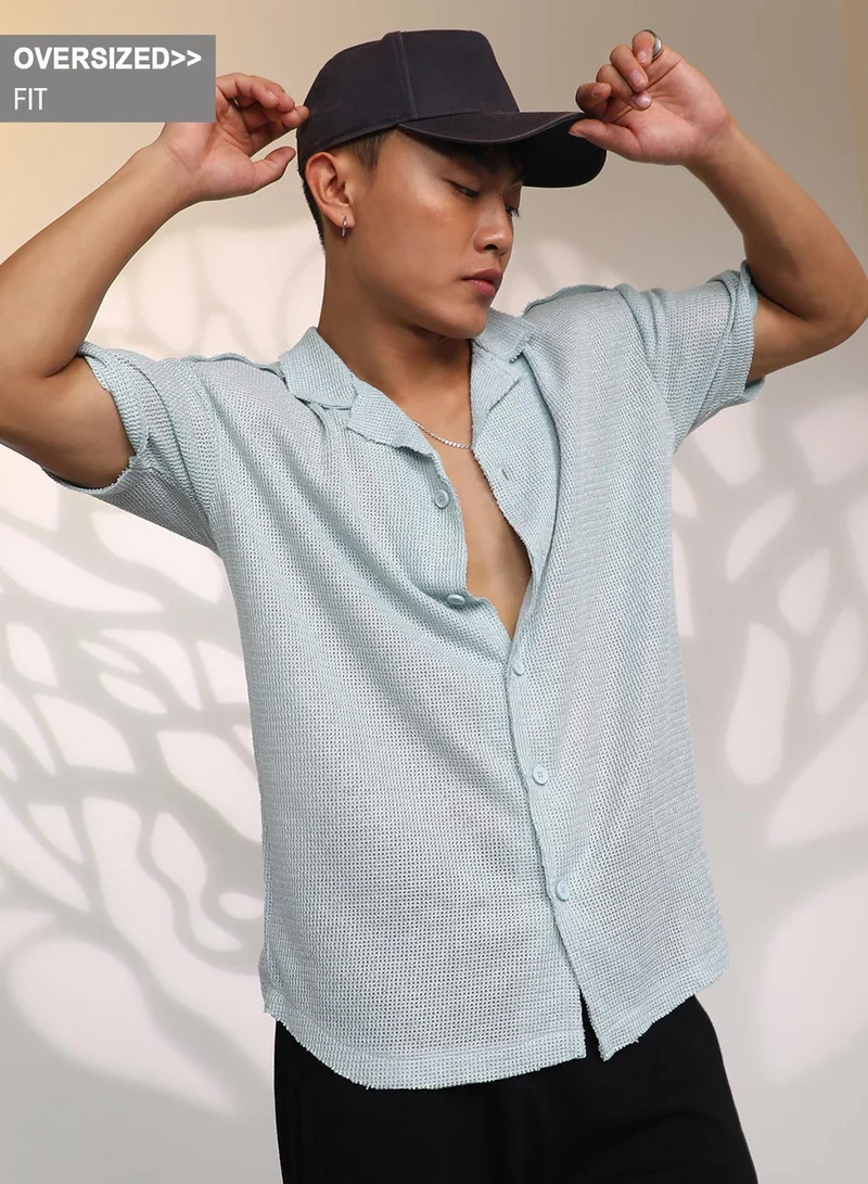 Campus Sutra Campus Sutra Men's Baby Blue Unhemmed Oversized Shirt For Casual Wear | Cuban Collar | Short Sleeve | Button Closure | Oversized Shirt Crafted With Comfort Fit For Everyday Wear