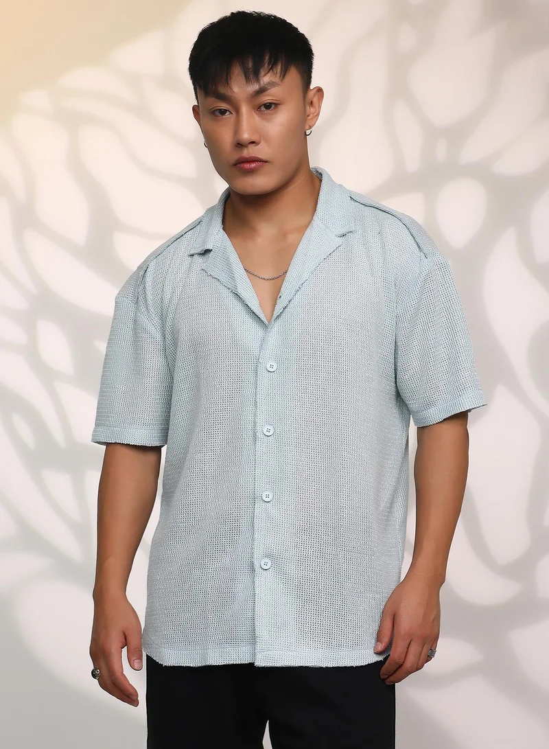 Campus Sutra Campus Sutra Men's Baby Blue Unhemmed Oversized Shirt For Casual Wear | Cuban Collar | Short Sleeve | Button Closure | Oversized Shirt Crafted With Comfort Fit For Everyday Wear