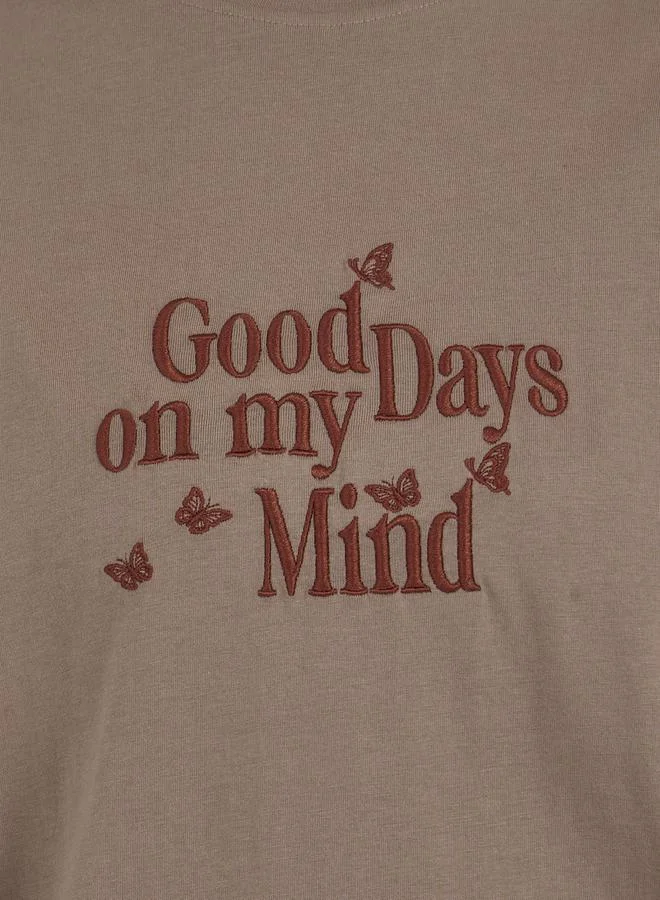 Styli Embroidered Slogan Dropped Shoulder Oversized T-Shirt
