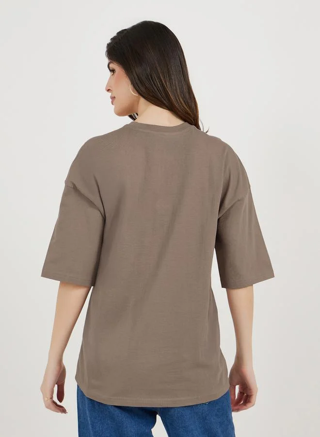 Styli Embroidered Slogan Dropped Shoulder Oversized T-Shirt