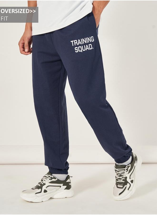 Styli Styli Eco Earth Slogan Print Oversized Training Joggers  - Image 1
