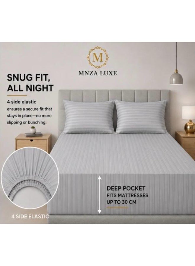 MNZA LUXE طقم شرشف سرير مطاطي من المايكروفايبر بتصميم خطوط 1 سم، يشمل شرشف سرير مطاطي واحد + 2 غطاء وسادة | فائق النعومة، قابل للتنفس ومقاوم للتجاعيد | لون رمادي فاتح - Image 1