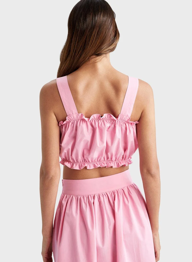 ديفاكتو بلوزة بتفاصيل ربط