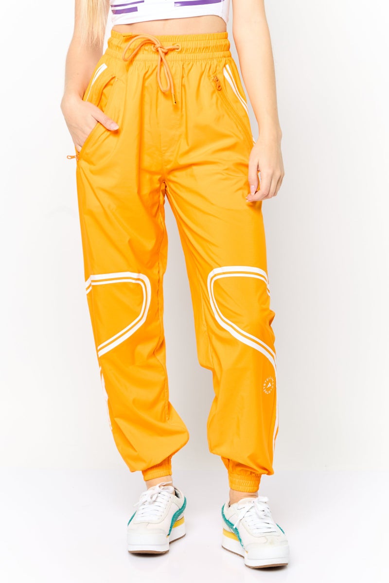 Adidas Women Sportswear Fit Outdoor Track Pants, Orange - Image 1