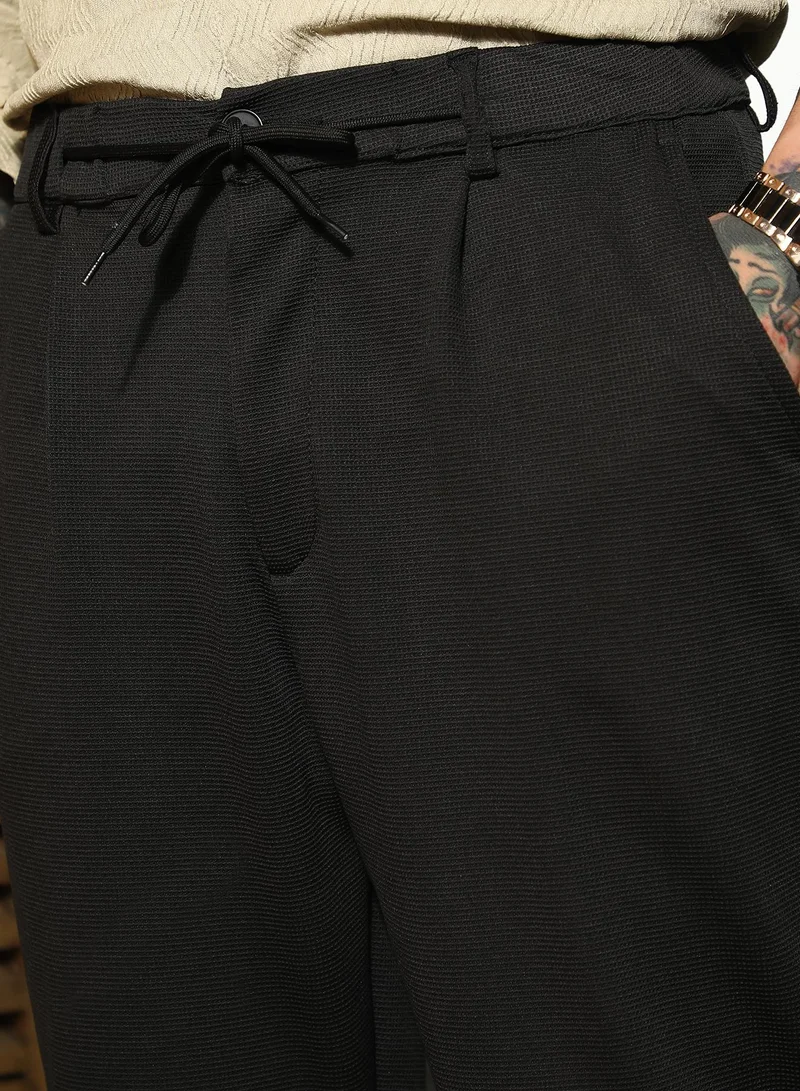 CAHOOT  Men's Onyx Black Micro-Waffle Straight Trousers For Casual Wear | Mid-Rise | Straight Fit | Drawstring Closure | Trousers Crafted With Comfort Fit For Everyday Wear for Men | Best Price UAE