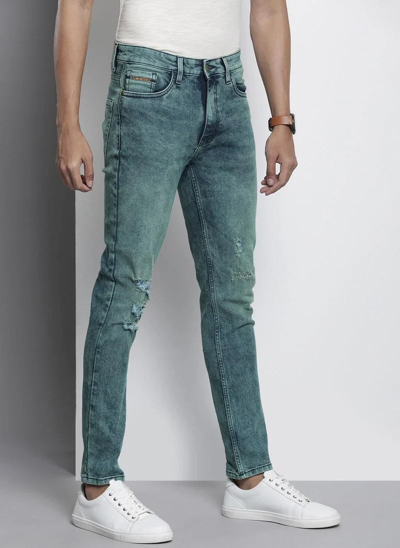 ذا انديان كراج كو Men Regular Fit Solid Mid-Rise Stretchable Jeans