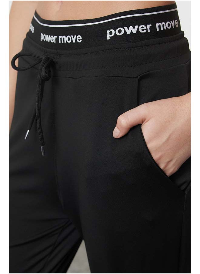 Black Diver/Scuba Fabric Slogan Elastic Detailed Knitted Sports Sweatpants THMAW25EA00005 - pzsku/Z949CFCFA7C85317657D0Z/45/_/1737376178/b4847ba6-8fca-4459-97dd-8527d110756d