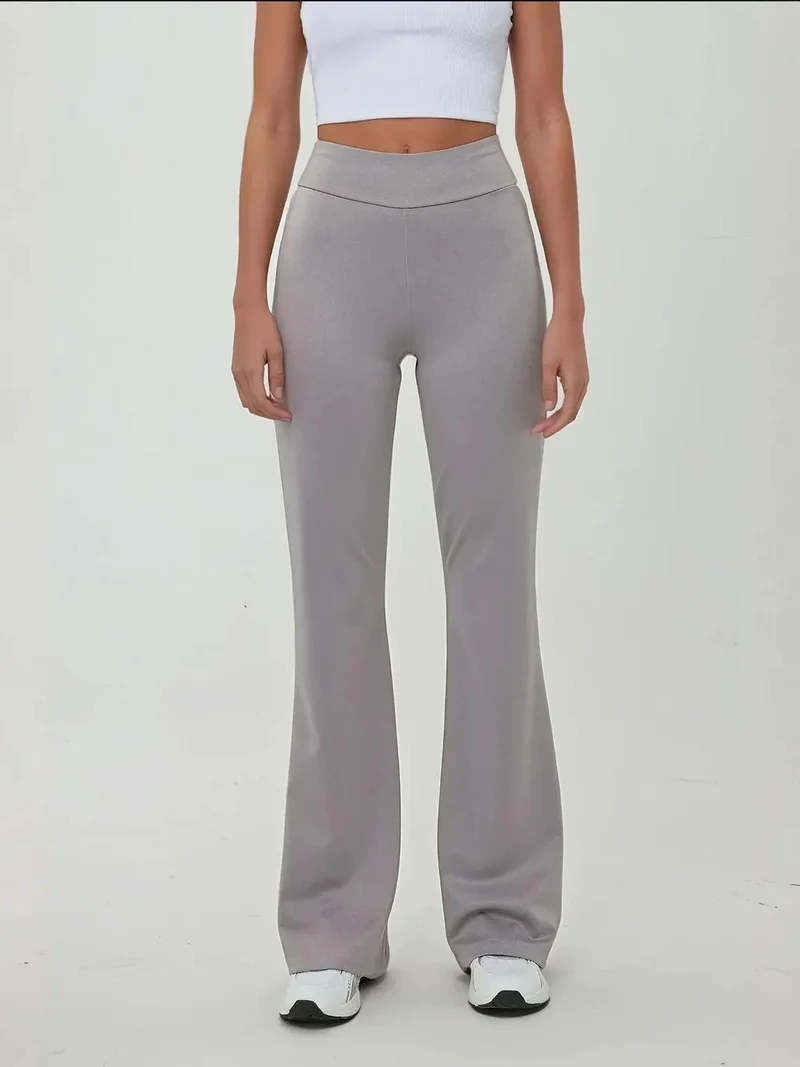 زوبعة بنطلون ضيق بخصر مرتفع وأرجل واسعة