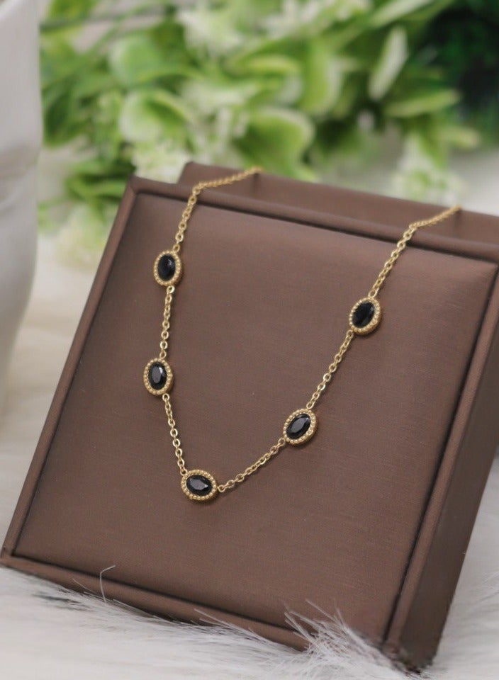 WARD Women's Stainless Steel Necklace Adorned with Oval Black Stones