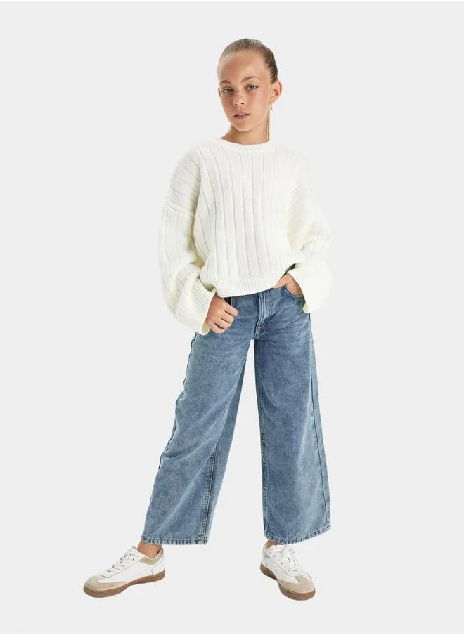 ديفاكتو Textured Oversized Round Neck Knit Sweater by Styli