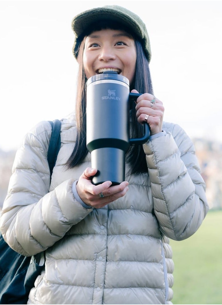Stanley - 40oz Stanley Cup Black Quencher H20 Flowstate Stainless Steel Vacuum Insulated Tumbler with Lid, Straw & Car Cup Holder Compatible for Water, Iced Tea, Coffee, Smoothie and More | BPA‑Free, Best Gift for All Oceans | Premium Eco‑Friendly Travel Mug with Advanced Flowstate Lid. - Image 1